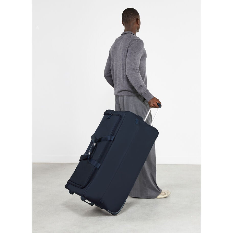 Foldable Plume Wheeled Duffel in the color NEW | Midnight Blue. image number 1