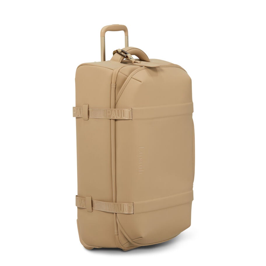 Lost In Berlin Exile Wheeled Duffel in the color Sandstone. image number 4