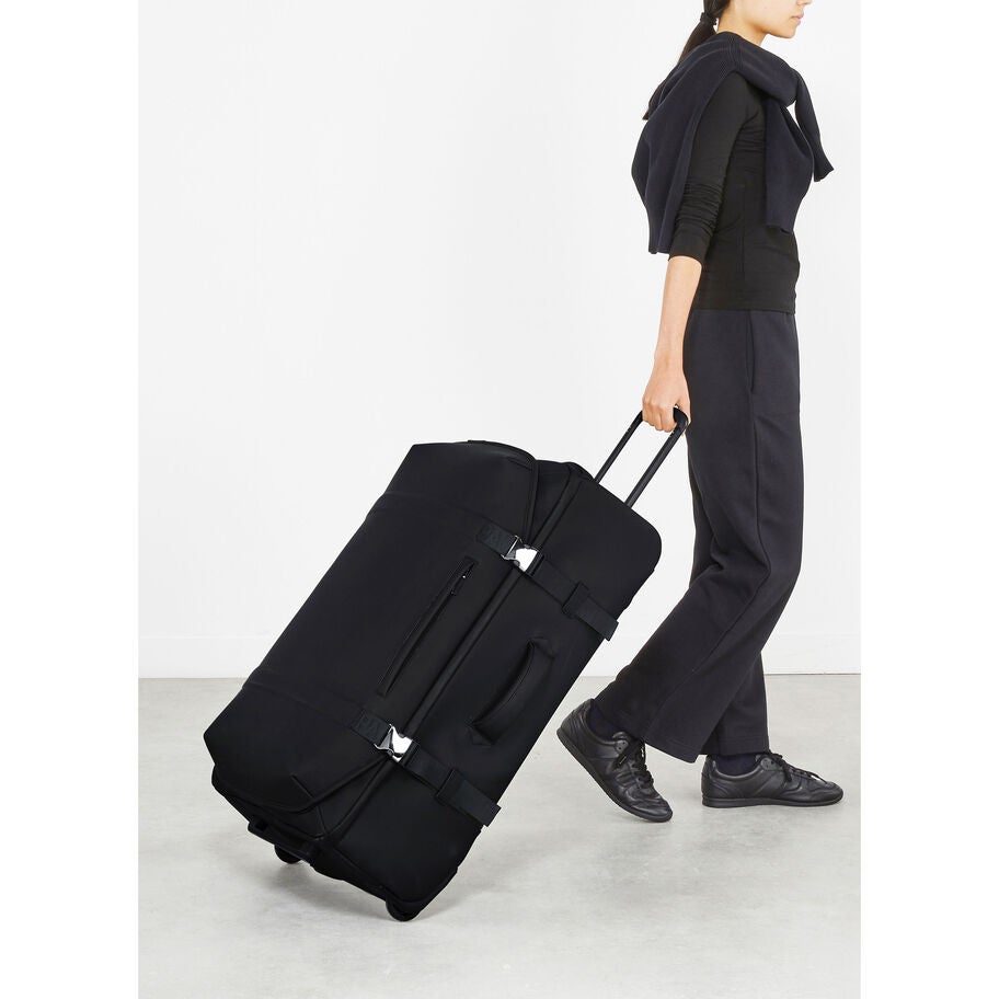 Lost In Berlin Large Exile Wheeled Duffel in the color Black. image number 1