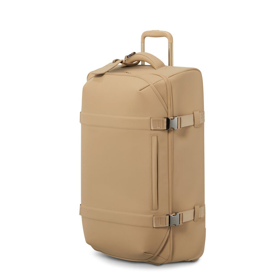 Lost In Berlin Exile Wheeled Duffel in the color Sandstone. image number 0