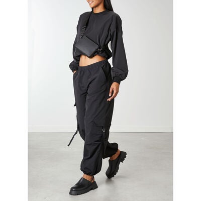 Lost In Berlin Crossbody Bag in the color Black.