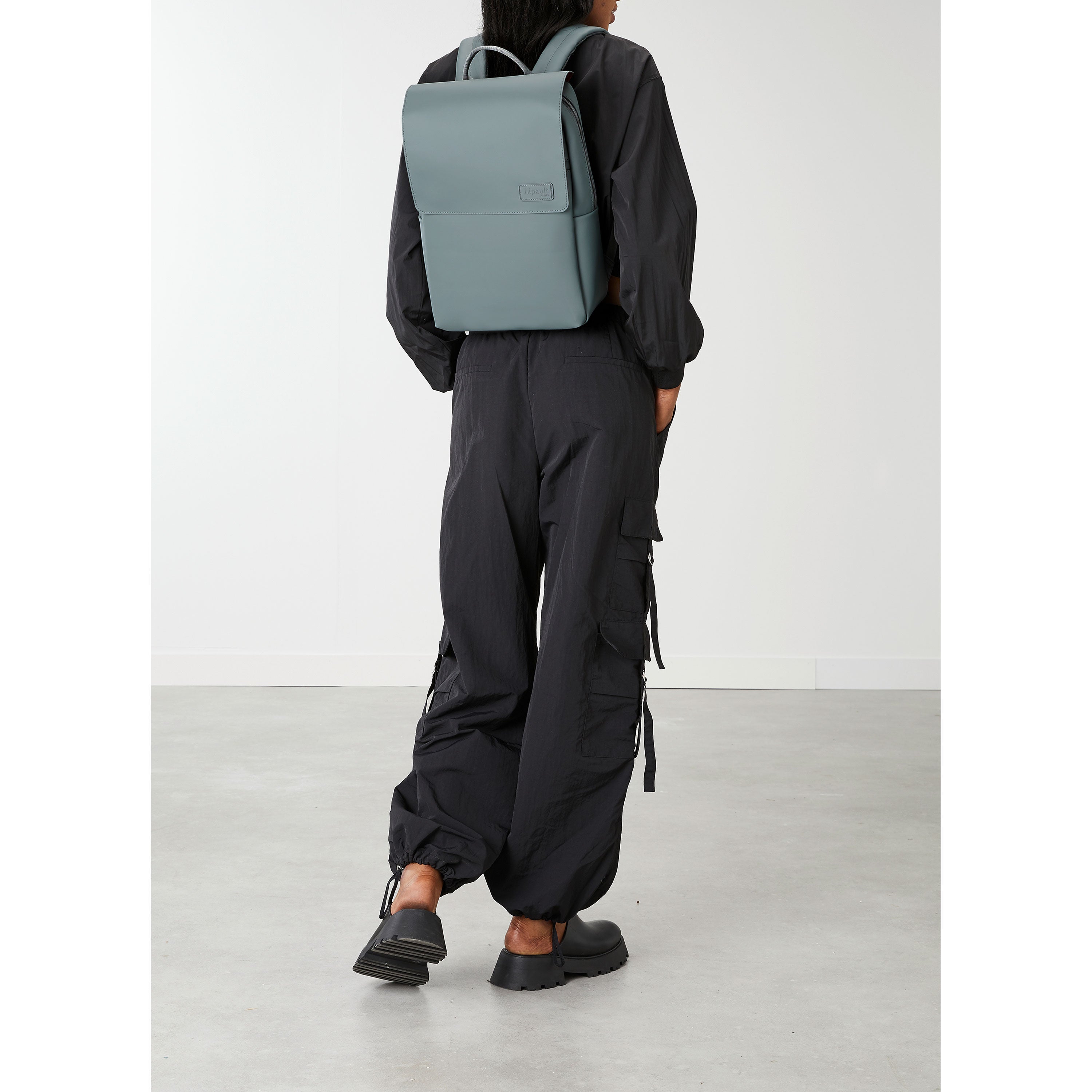 Lost In Berlin Square Backpack in the color Cement Storm. image number 7