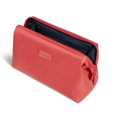 Plume Accessories Toiletry Kit in the color Guava Juice.