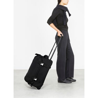 Lost In Berlin Cabin Exile Wheeled Duffel in the color Black.