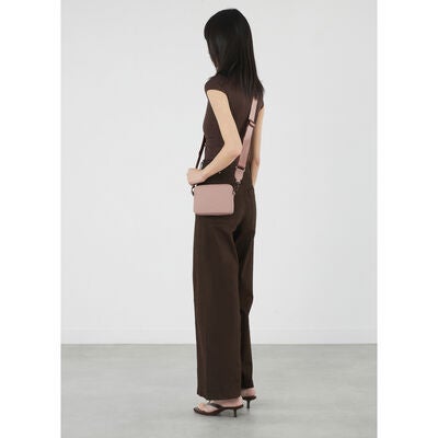 Lost In Berlin Crossbody Bag in the color Rose Quartz.