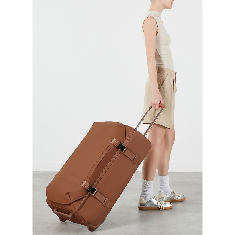 Lost In Berlin Exile Wheeled Duffel in the color Nutsy Nut. image number 1